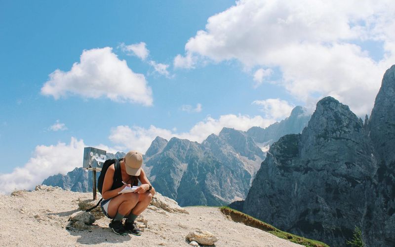 Person looking at a clear mountain landscape symbolizing clarity